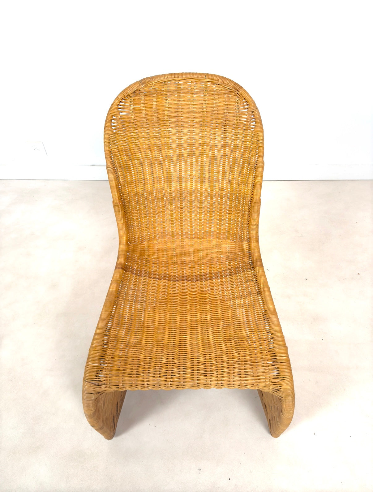Chaise en rotin dans le goût de Verner Pantin