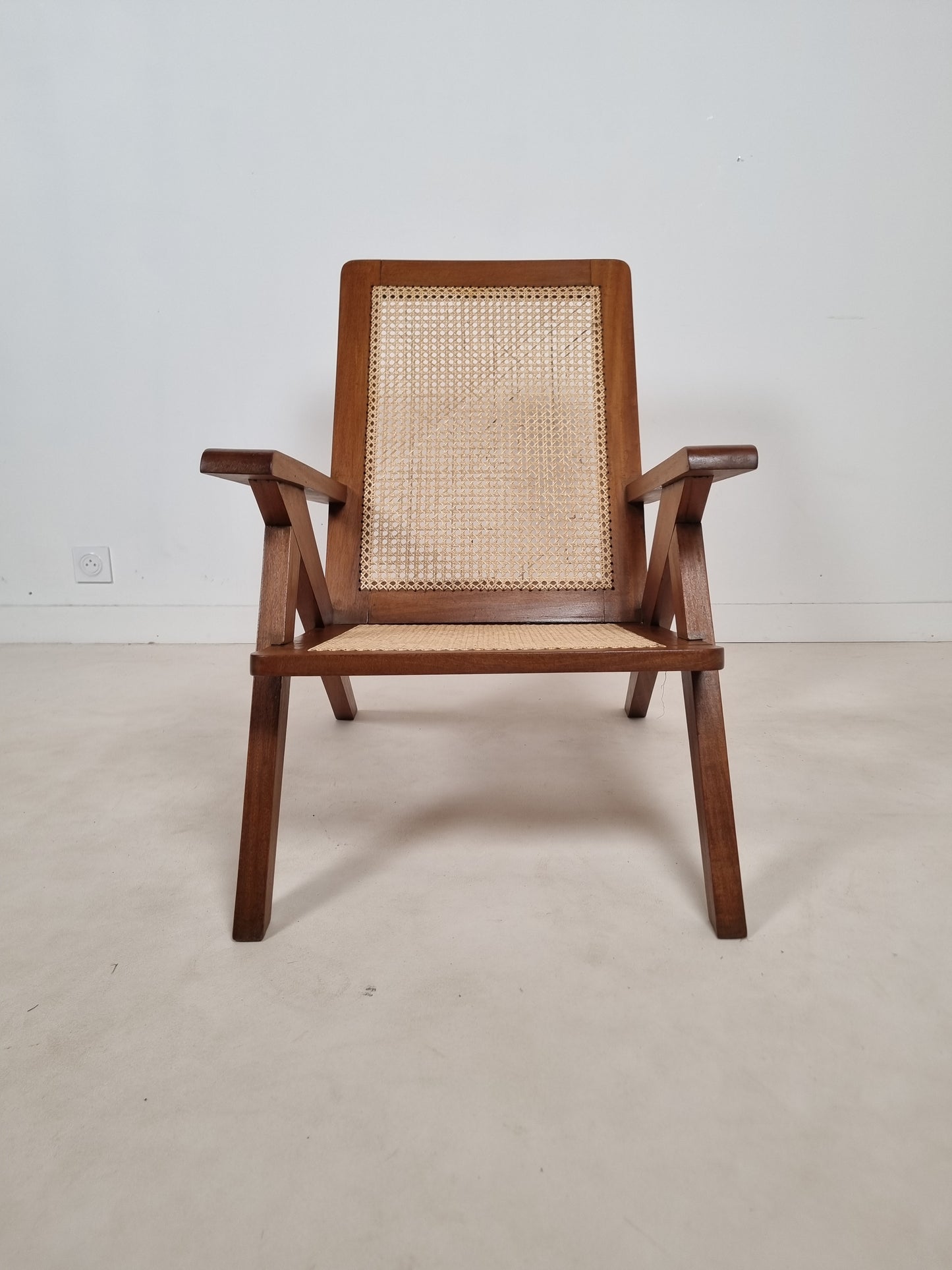 Fauteuil canné du Comptoir Français à Brazzaville. 1950