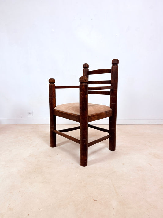 Fauteuil brutaliste ancien
