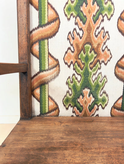Trône ancien tapissé