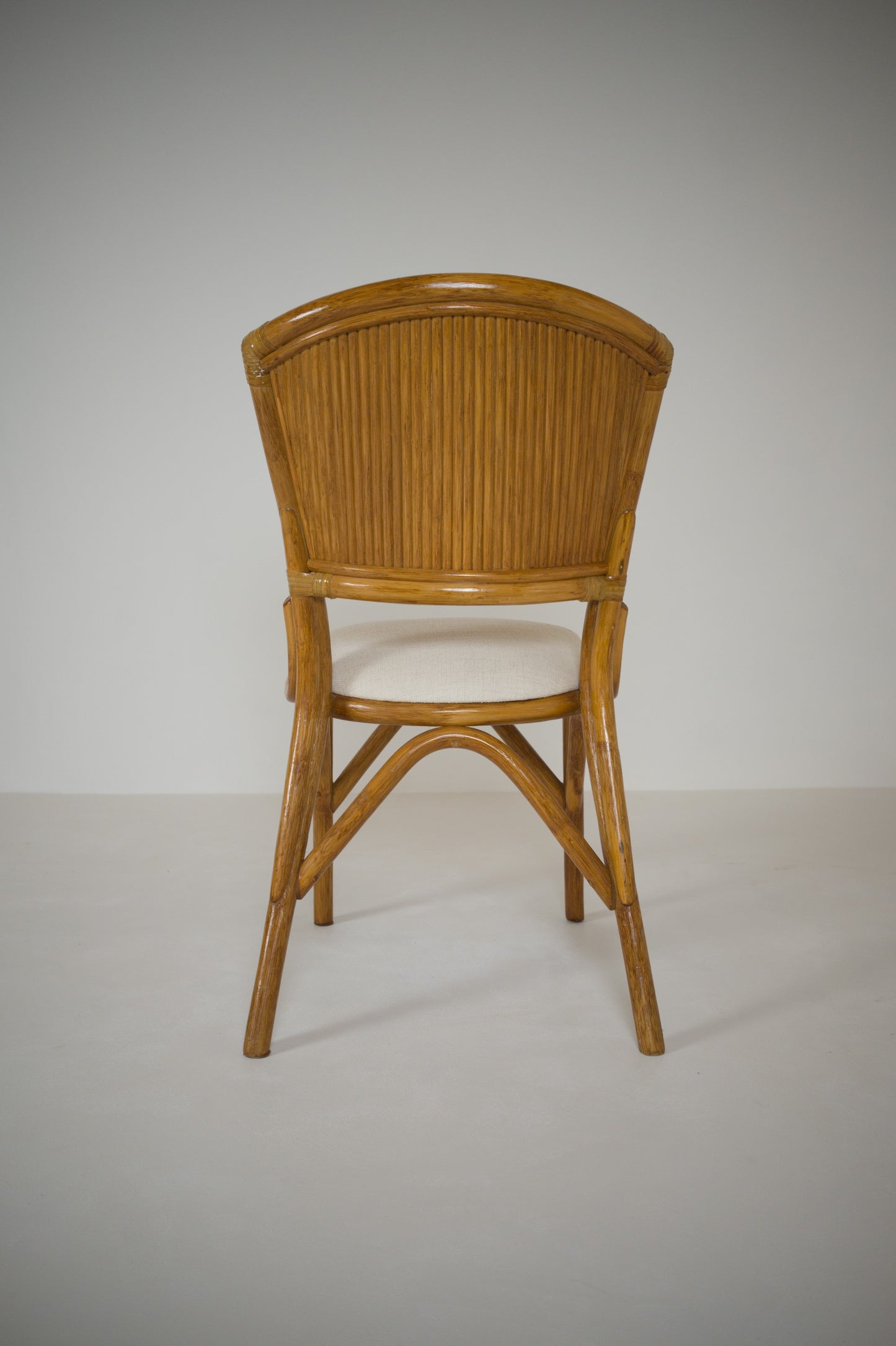 Ensemble table et 4 chaises vintage en rotin esprit Riviera
