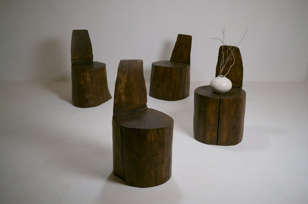 Set of four brutalist monoxyl armchair