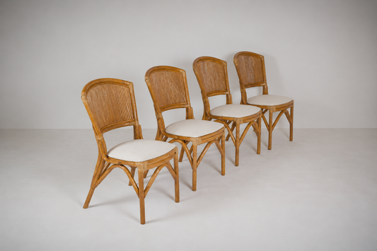 Set of four rattan chairs. C1970
